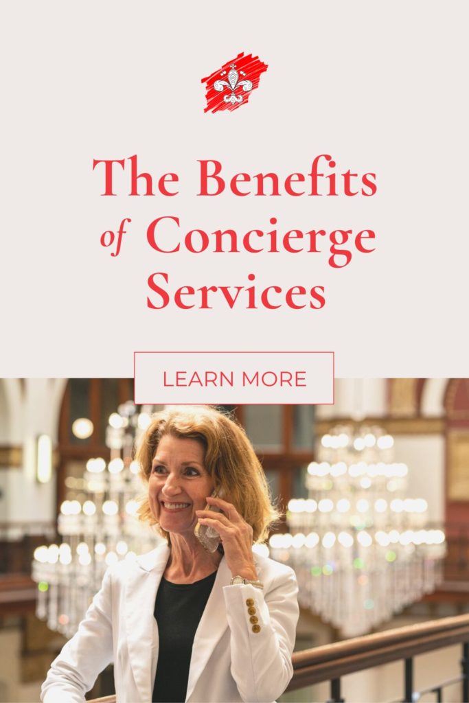 Julie Hullett wearing a white blazer and black t-shirt. She is smiling and talking no the phone. There are chandeliers behind her. Copy near the image says "The benefits of Concierge services"